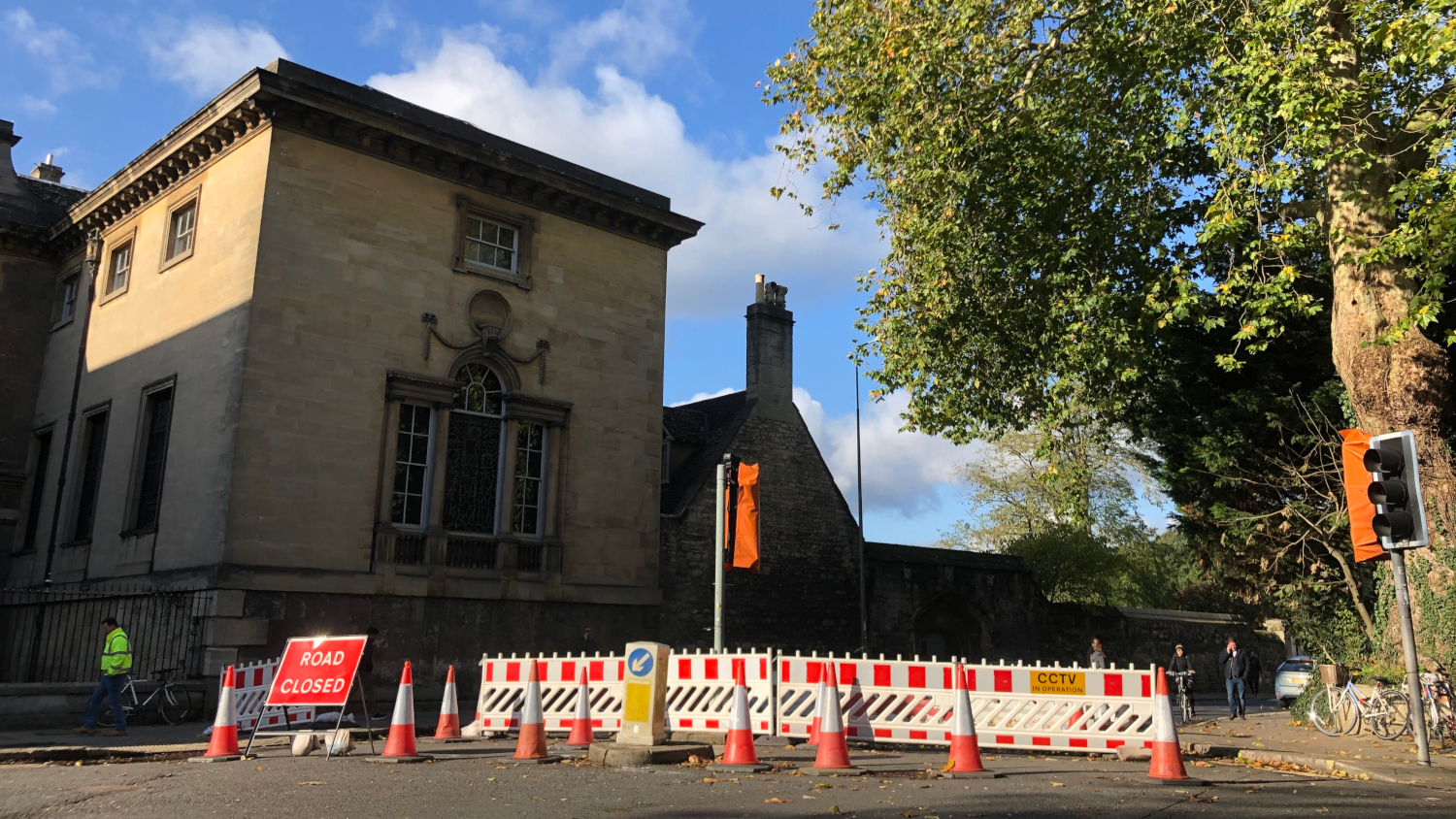 Orange alert. Three sets of barriers, and clusters of cones, should keep the cars at bay 