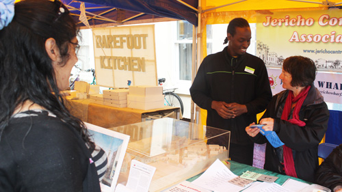 Ricardo from the Co-op and Sue selling tickets on the Community Association stall