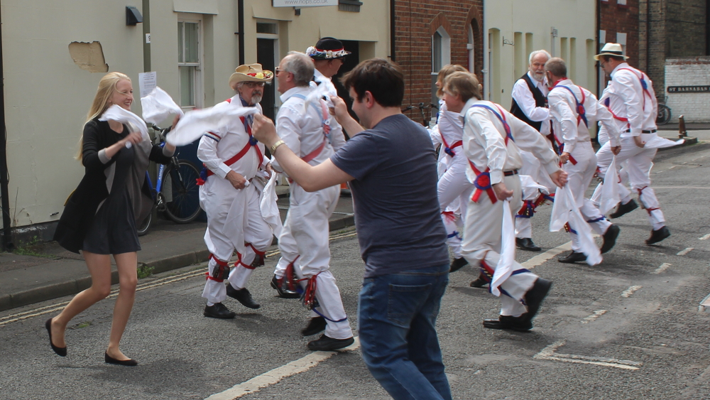 Local residents try their hands, and feet, with the Morris dancers