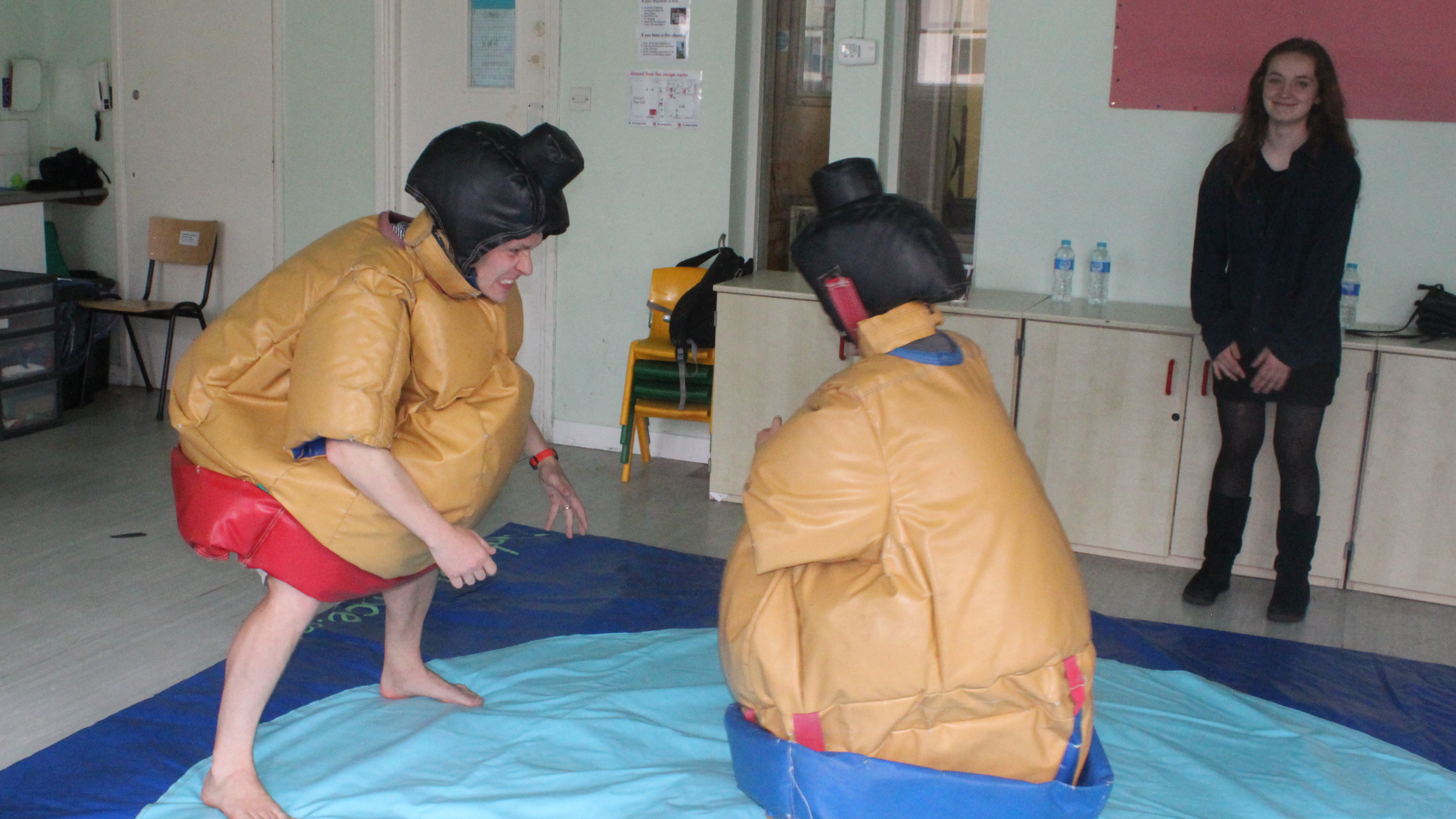 Grrhh! Father and son face off as sumo wrestlers