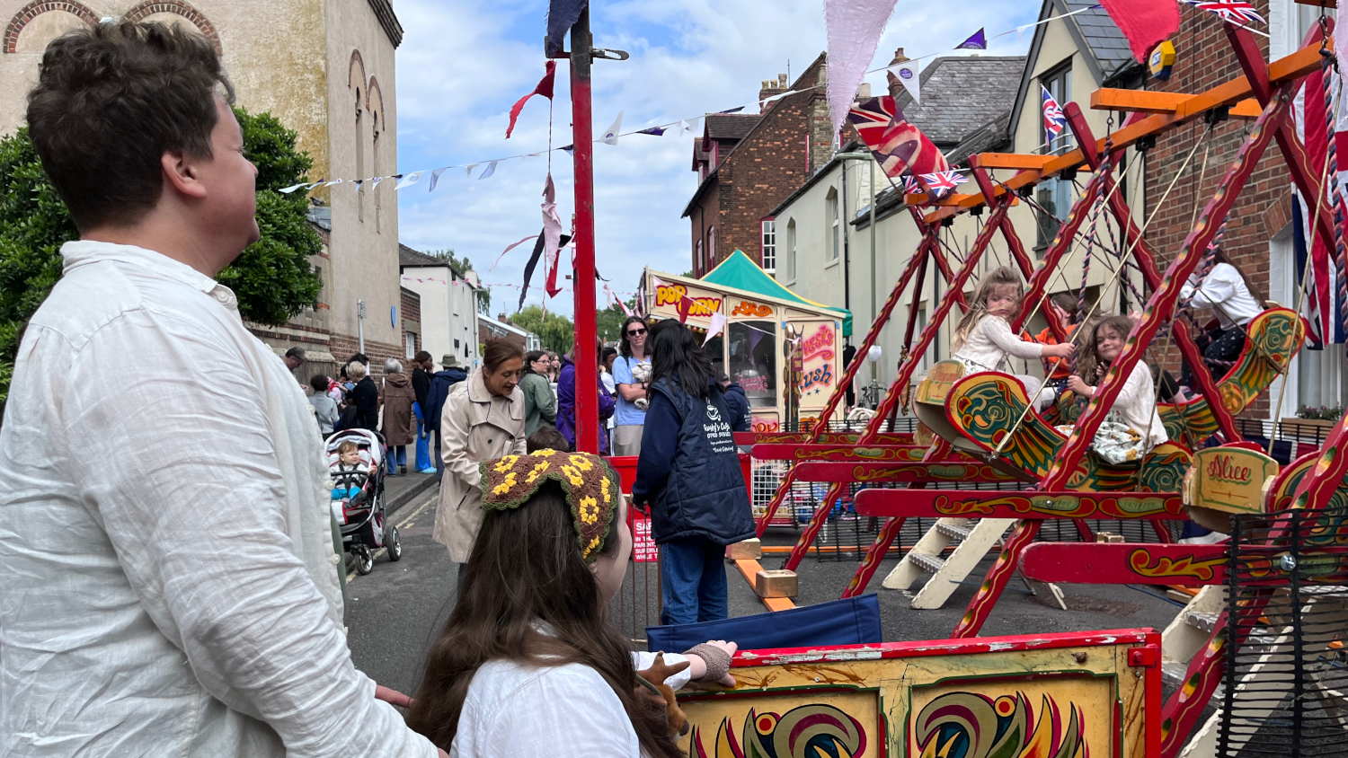 <p>James and Lucy keep an eye on&nbsp;the swinging Catchpoles</p>