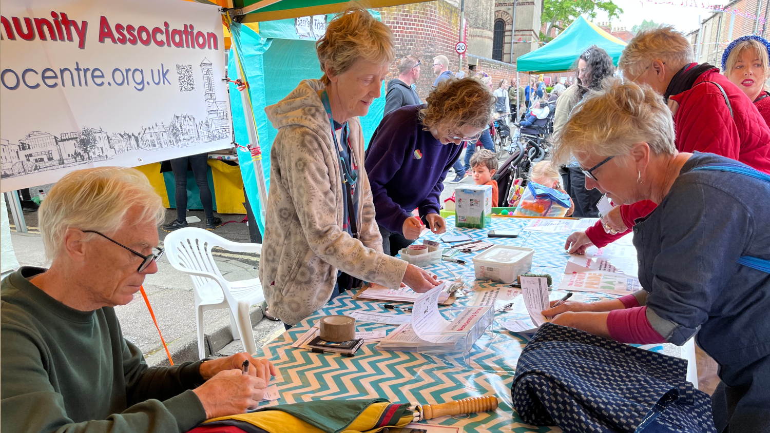 <p>The Christies keep up with the raffle ticket sales</p>