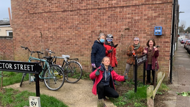 <p>The sky blue Bee Hotel attached to the wall at the junction of Victor and Street and Canal Street</p>